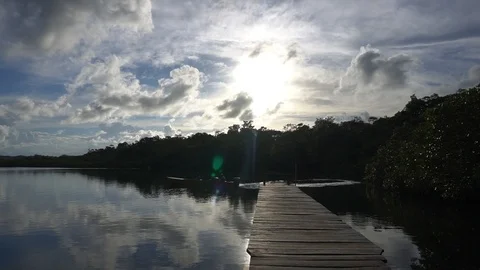 Small Boat Driving On Water With Reflection Of Beautiful Sky [Slow Motion] Stock Footage 89876167