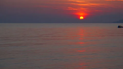 A small boat during a sunset Video stock 68994914