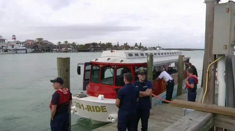 Small boat fire on johns pass village Stock Footage 687235