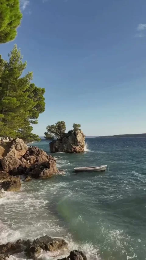 Small Boat Floating on Calm Sea Stock-Footage 340872030