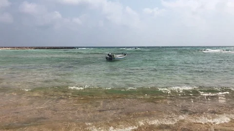Small Boat Floating in The Ocean Video stock 95034460