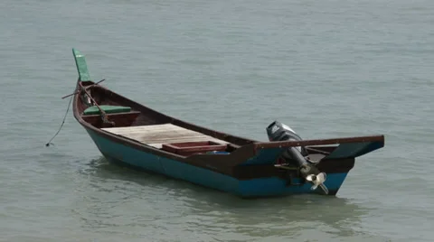 Small boat floating in the sea Stock Footage 28011484