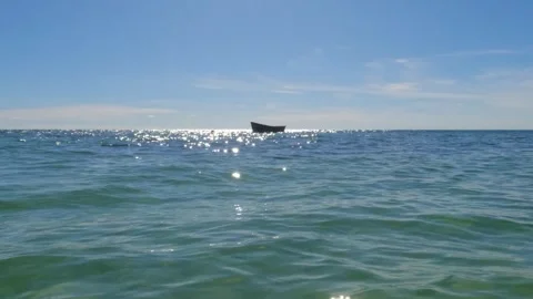 Small boat floating on the sea Video stock 272654700
