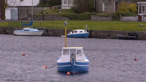 Small boat floating in the water 스톡 동영상 87366883