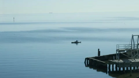 Small Boat Floating on Water Stock Footage 262217991