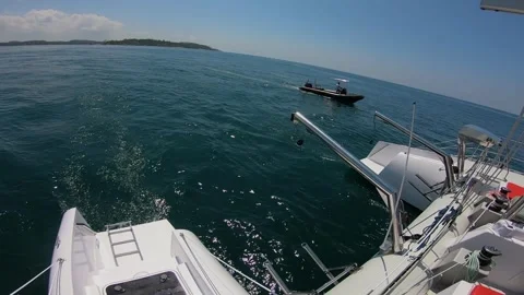 Small boat following Stock Footage 288233909