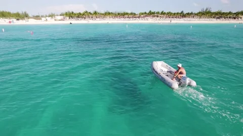 Small boat going the beach of Bimini beach 動画素材 232437486