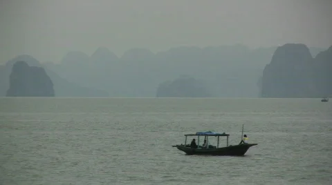 Small boat in Halong Bay Stock Footage 466856