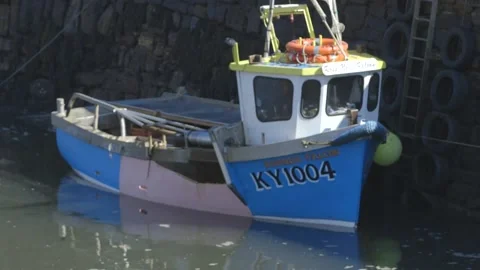 Small boat in harbour Stock Footage 159475511