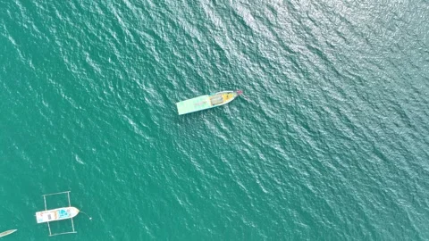 Small boat in the middle of the ocean Stock Footage 252390605