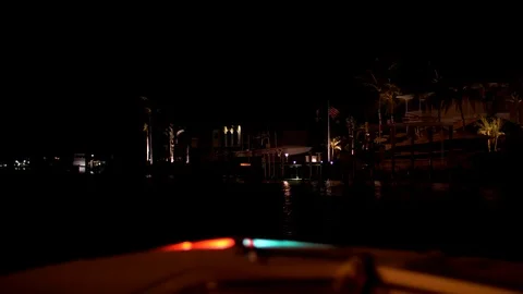 Small Boat Navigating Waters at Night with Alert Lights Stock Footage 93759324
