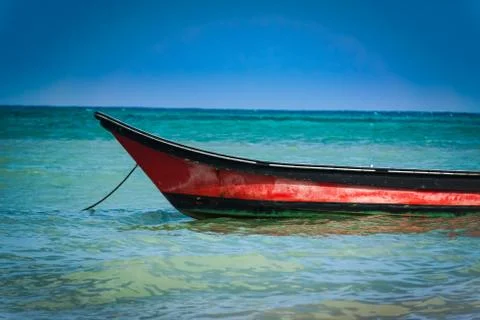 Small boat in the ocean Stock Photos