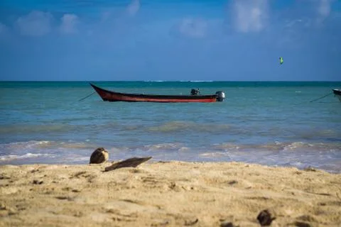 Small boat in the ocean Stock Photos