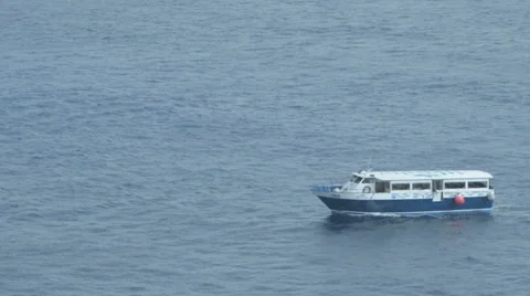 Small Boat out in the ocean Stock Footage 46621519