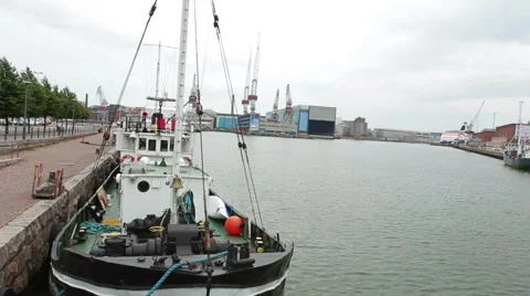 A small boat in the port Stock Footage 44054703