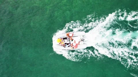 Small boat racing on the beach Stock Footage 232427816
