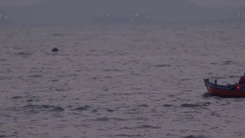 Small boat riding in the ocean Video stock 72472860