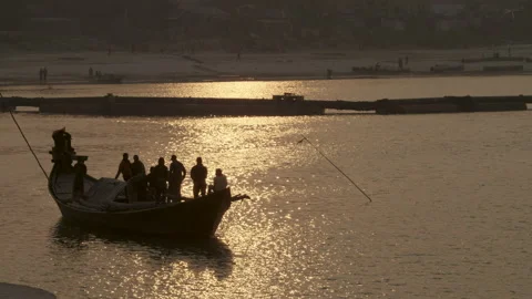Small Boat on River during Sunset in Bangladesh Stock Footage 142010634
