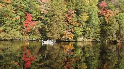 Small boat on a river Stock Footage 42438214