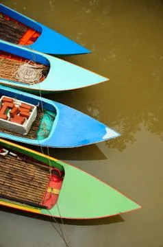 Small boat in river Stock Photos