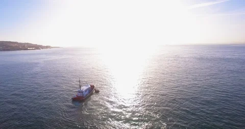 Small boat in the river tejo, Lisbon Portugal Stock Footage 91220680