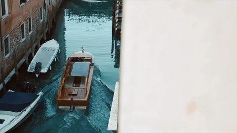 Small Boat Sails Through A Narrow Canal. Stock Footage 106095229