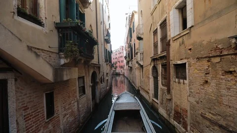 Small Boat Sails Through A Narrow Canal. Stock-Footage 108056740