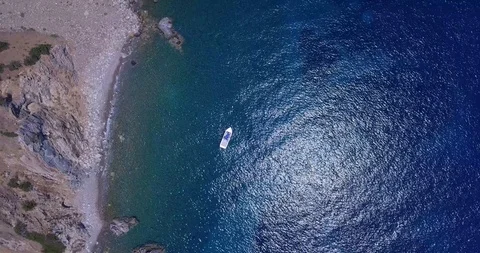 Small boat in the sea by the beach Stock Footage 93398245