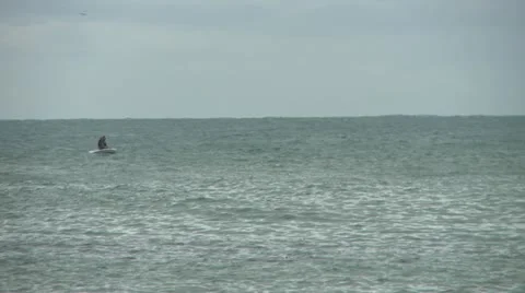 Small boat on sea Stock Footage 22337378