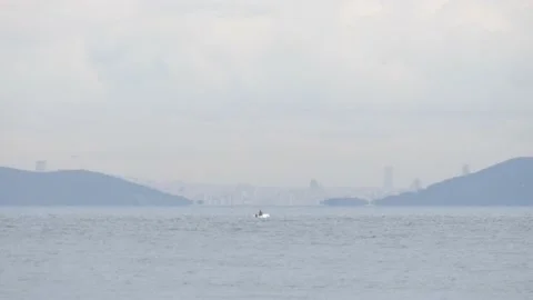 Small boat in the sea Stock Footage 219009689