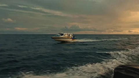 Small boat at sea Stock Footage 240638445