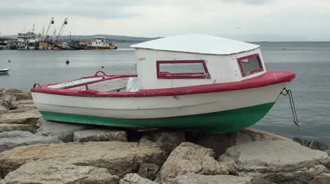 Small boat on the seashore Stock Footage 24979721