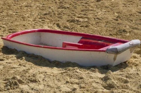 Small boat stranded in the sandpit Stock Photos