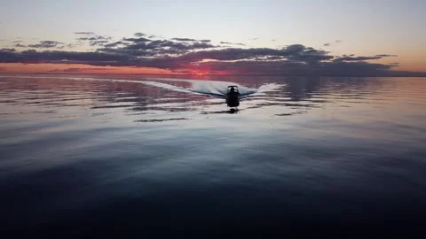 Small Boat at Sunset Stock Footage 286297677