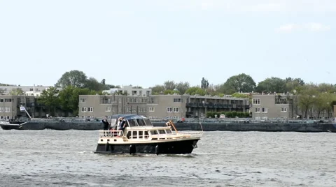 Small boat with waving people Stock Footage 50114957