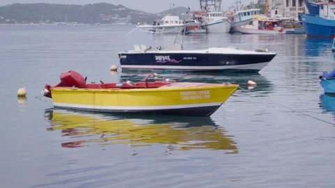 Small Boats anchored in The Carenage harbor, Grenada Stock Footage 313406853