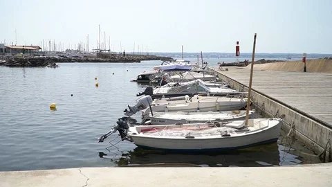 Small boats by the dock 動画素材 128348388