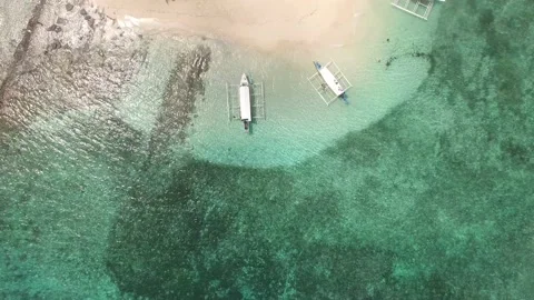 SMALL BOATS DOCKED IN SMALL BEACH Stock Footage 130512509