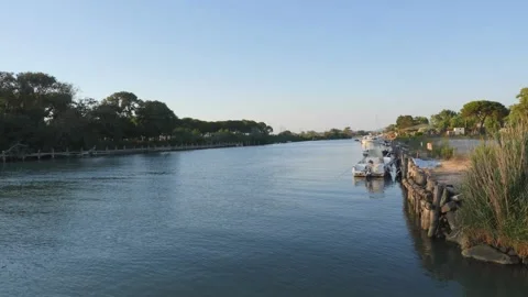 Small boats floating in small harbour Stock Footage 136150475