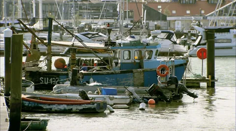 Small boats in harbour Stock Footage 37618681