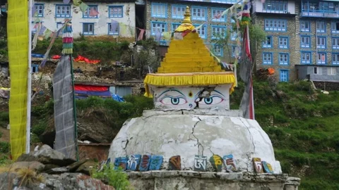 Small Bodhnath stupa with prayer flag around in Kathamandu Stock Footage 77448093