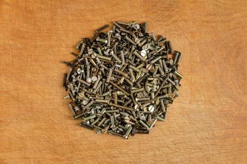 Small bolts on a table in the center. Foto stock
