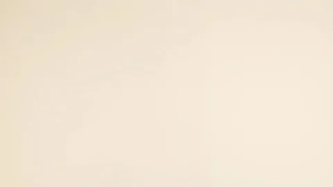 Small Book On Beige Background Video stock 77905971