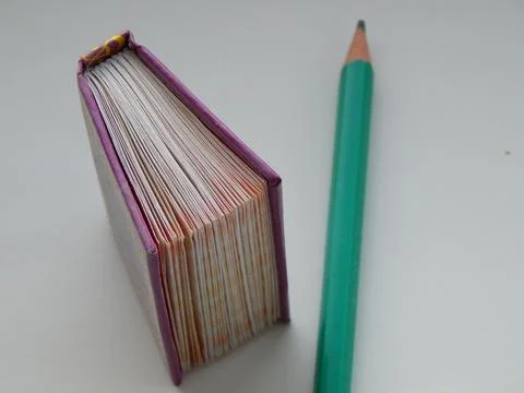 Small book with pencil 库存照片