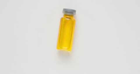 Small bottle with colored liquid Stock Footage 146482207