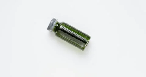 Small bottle with colored liquid Stock Footage 146482240