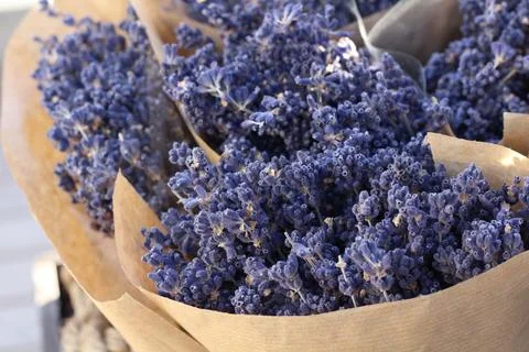 Small bouquets of lavender in paper close-up Stock Photos