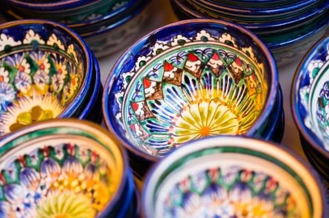 Small bowls with oriental-style patterns, painted with bright colors. Are on Stock Photos