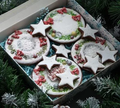 Small box over a table set for tea with winter decorations Stock Photos