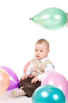 Small boy with balloons Stock Photos